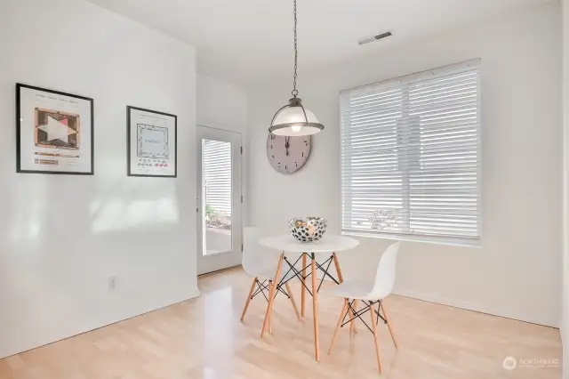 Large dining area with door to backyard