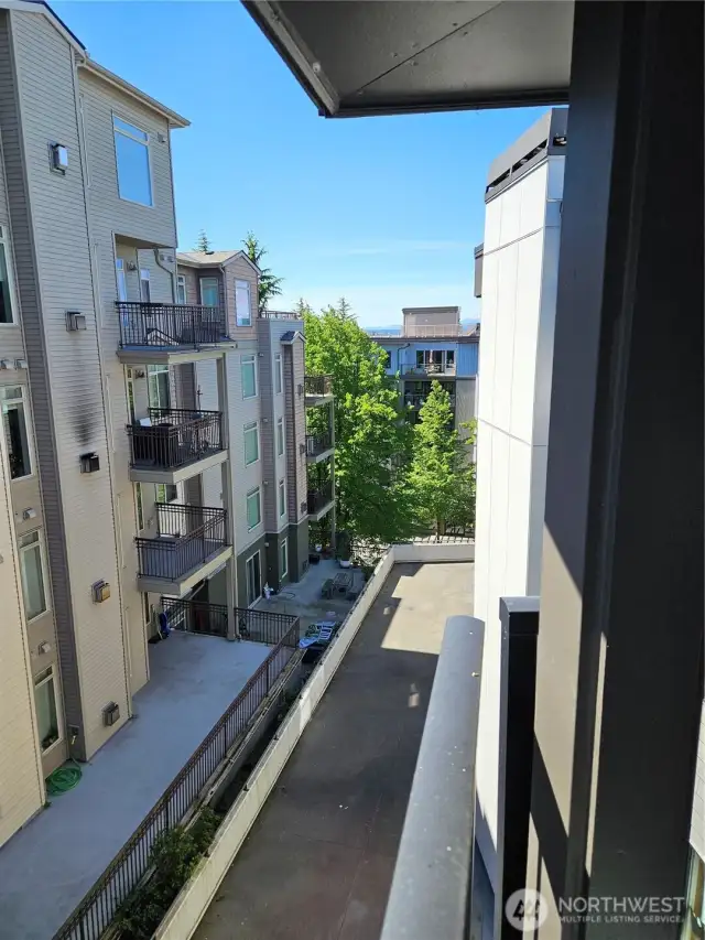 VIEW FROM COVERED PATIO. TOP END UNIT