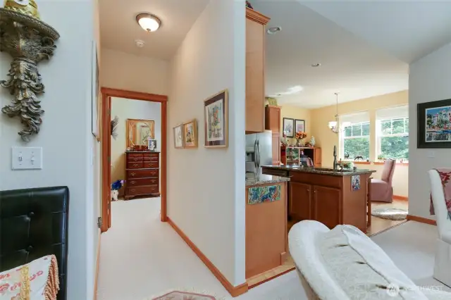 Wide hall to main bathroom and utility room
