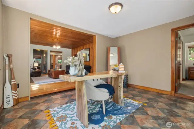 Office/den opens up to the huge beautiful deck with views of nature and the lake.