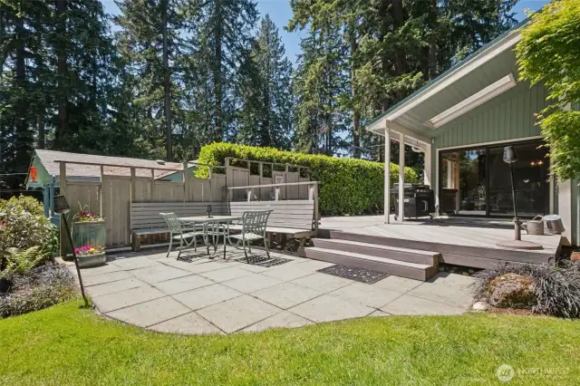 Covered Deck with Forest and Lake Views – Perfect for morning coffee or evening unwinding, rain or shine.