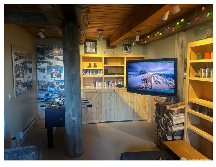 Craftsmanship runs throughout with built-ins and original log beams and pillars