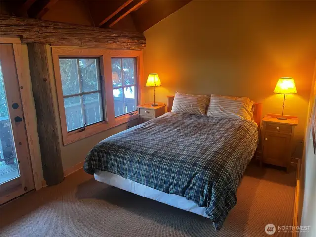 Primary bedroom with ample closet space, King bed and elevated views