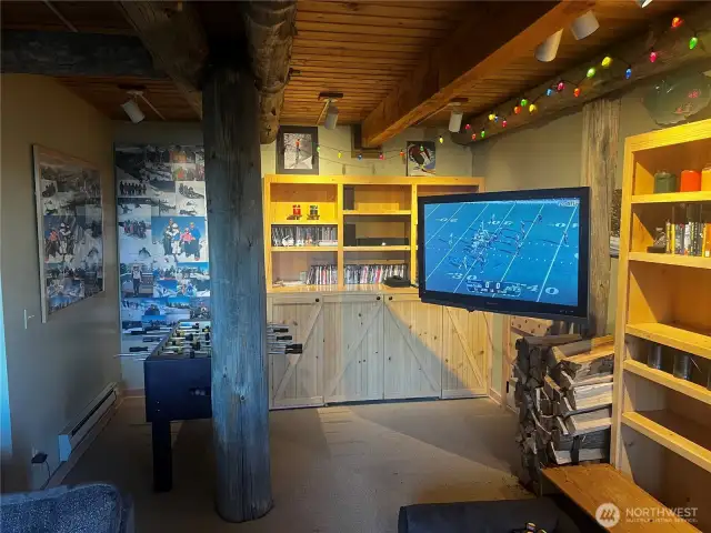 Craftsmanship runs throughout with built-ins and original log beams and pillars