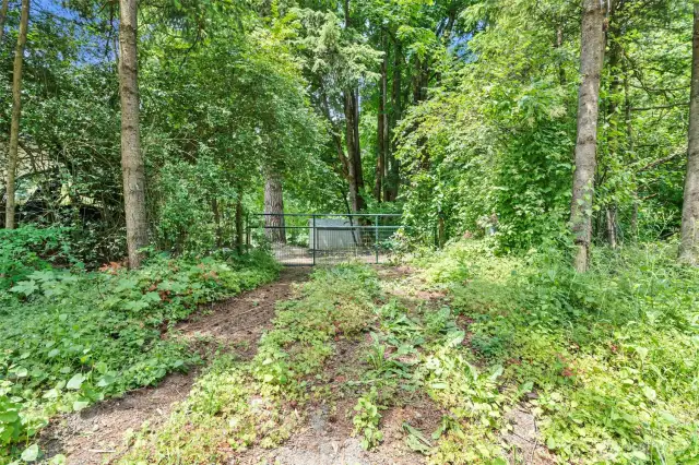 Gated side entrance to the horse area
