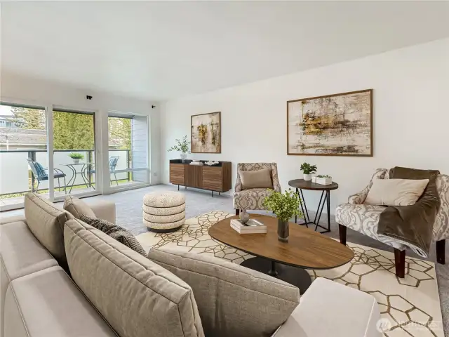 Virtually staged photo. Spacious living room with new carpet/paint