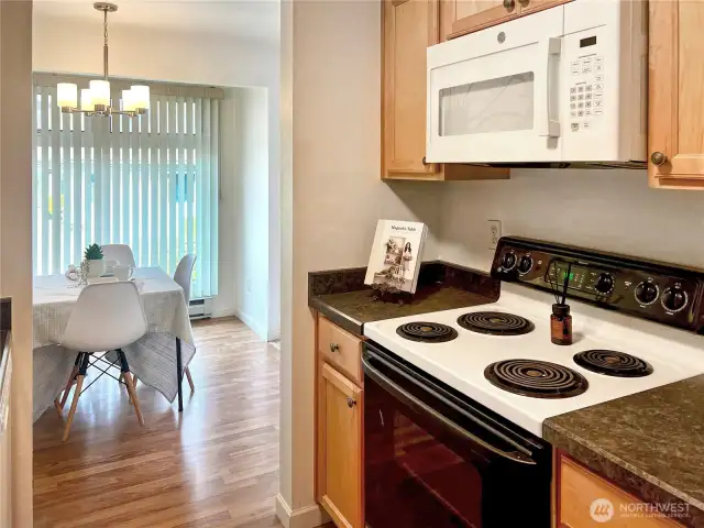 Kitchen opens up to the spacious dining room.