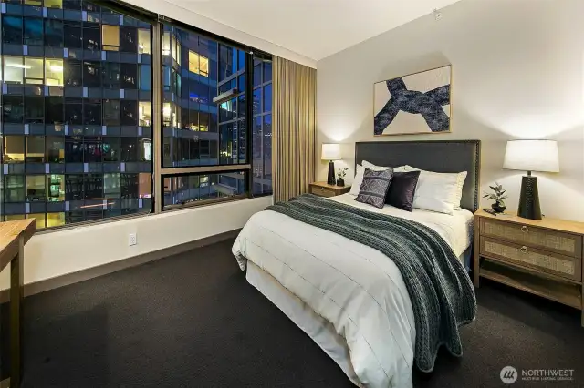 Primary bedroom with incredible city views.