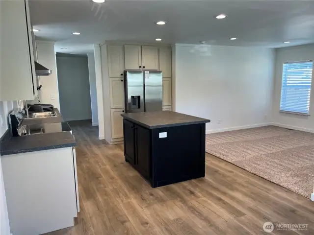 View of kitchen from dining/eating area.