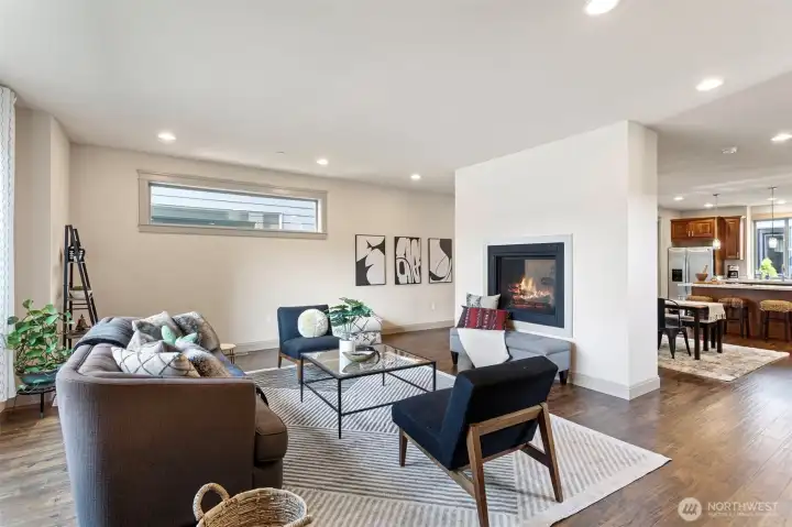 2 sided fireplace separates the dining area