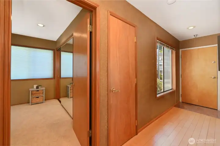 Front hallway door and coat closet and bedroom door.