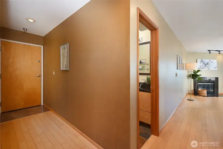 Front hallway w/marble threshold and hardwood floors.