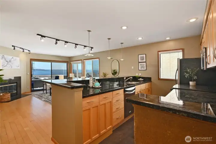 Kitchen has full view of sound and Mountain View.