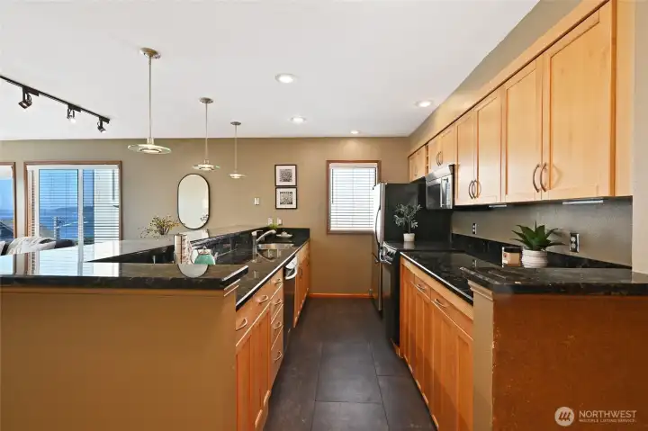 Washer and Dryer are in cabinets on right side under counter.