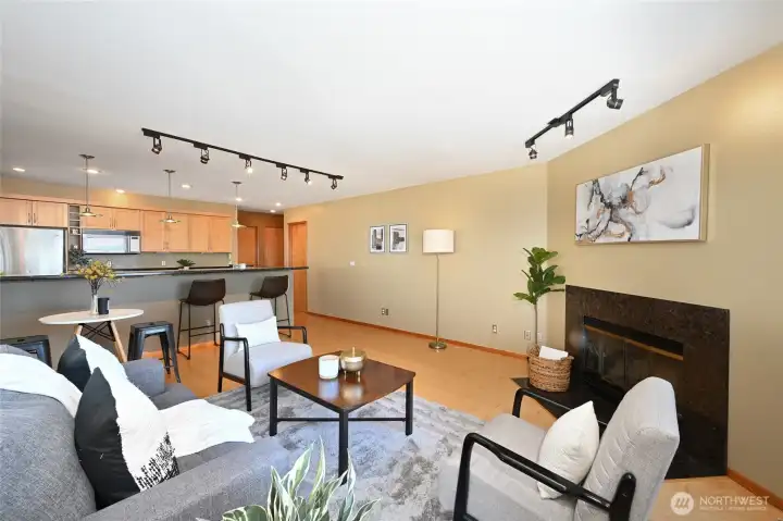 Nice Maple wood floors, fireplace, breakfast bar.
