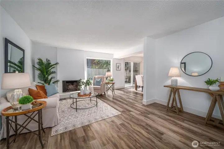 Step inside and take it all in! Notice the new flooring, Milgard windows, fresh interior paint and abundant natural light!
