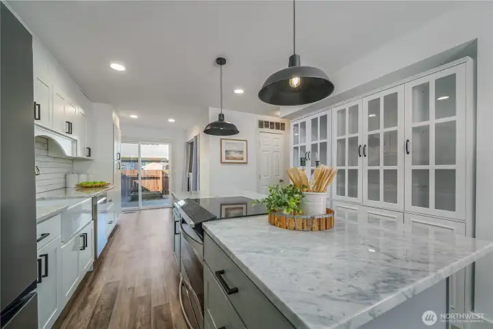 At the end of the kitchen is a convenient laundry area with washer and dryer.