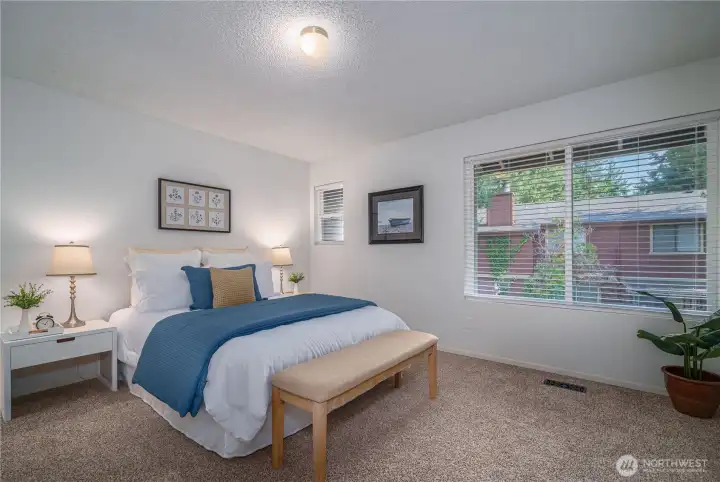 Upstairs, retreat to the spacious primary suite.