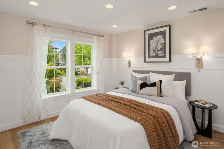 Ground level guest suite looking out to the proud Crestview community, enter right through garage.