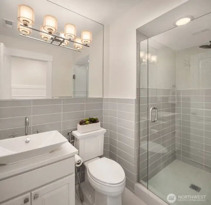 Private bathroom for ground-level guest room.
