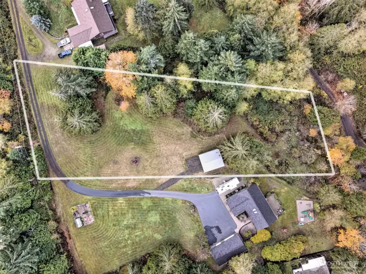 RV carport already there, as well as a 3-bedroom installed septic system and a shared well with the neighbor. It's READY!