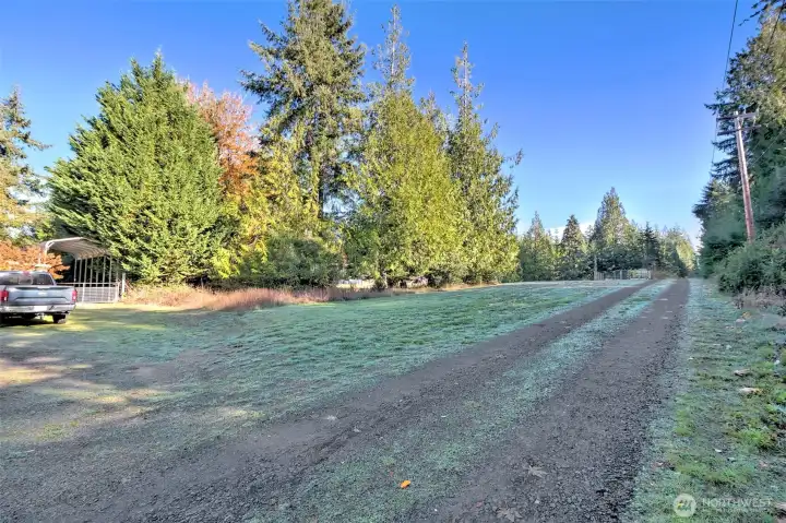 Coming up the driveway passed the first neighbor. Three homes share this gated entry driveway off of South Island Drive.