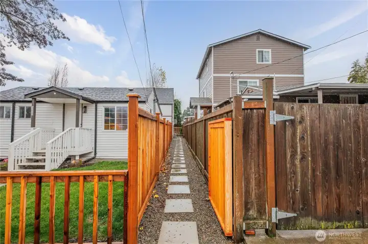 Paved and lit walkway to access the home.