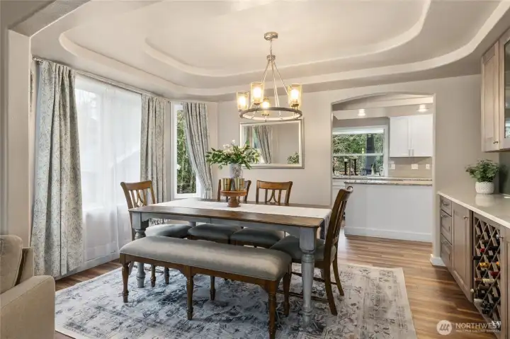 Formal dining room flowing off the kitchen and formal living room.