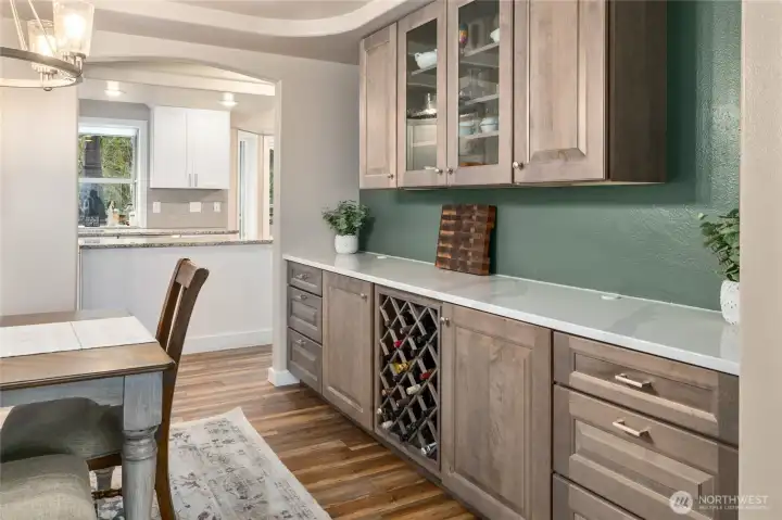 Butler counter in the formal dining room for spectacular additional  counter space for hosting as well as storage.