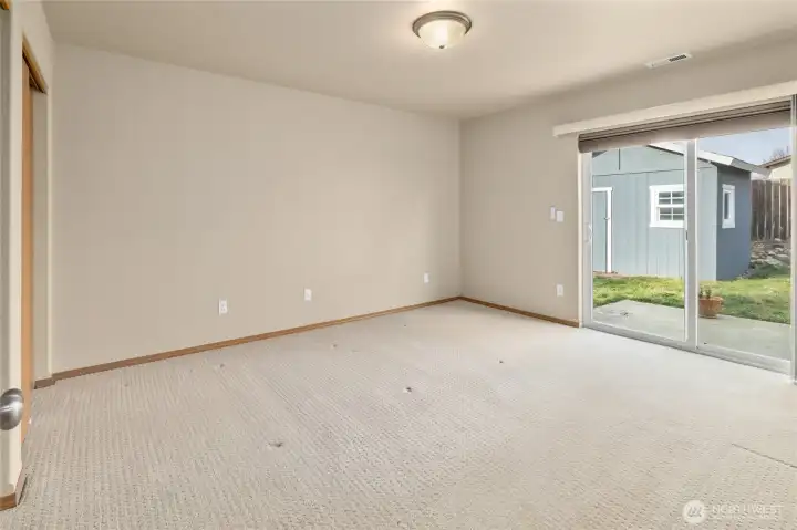 Primary Bedroom with access to back patio