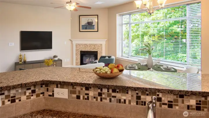 Open floor plan means you can be in the kitchen preparing snacks and won't miss a minute of the game!