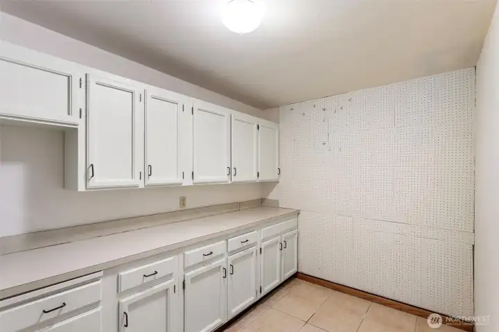 Unheard of --- a large utility room with storage in the unit.