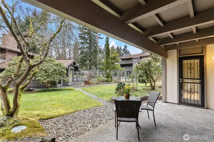 Covered patio with space for dining el fresco in the summers.