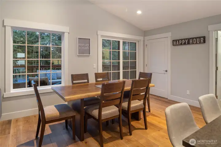 Kitchen flows naturally into the dining area, creating a comfortable open layout perfect for hosting gatherings.