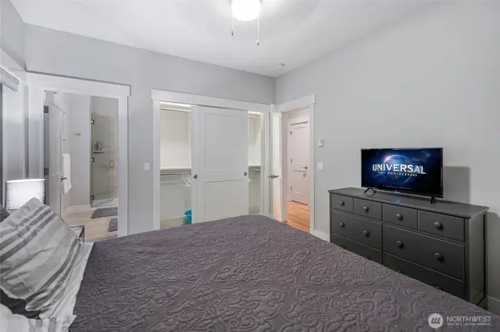 Spacious primary suite with direct access to the ensuite bath, offering comfort and functionality.