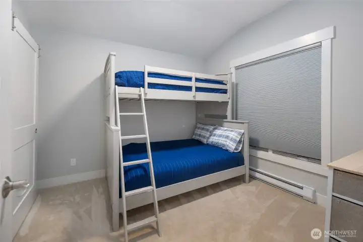 Versatile guest bedroom —perfect for hosting family and friends during island visits, or use as an office.