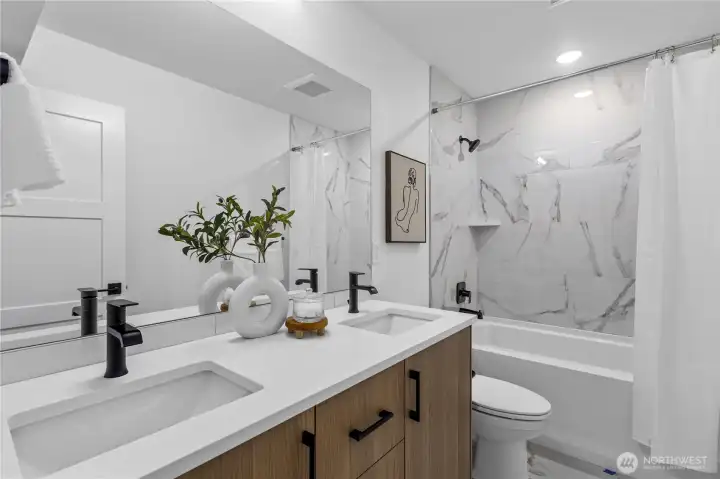 Photos of similar unit to showcase floor plan and quality.