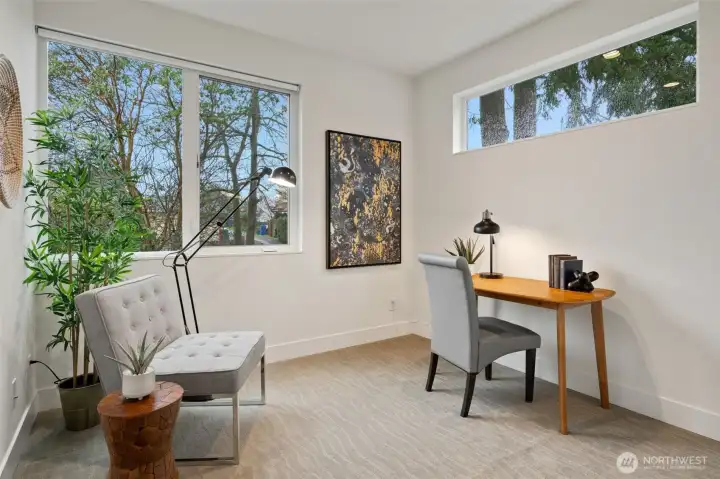 The 3rd bedroom at the back of the house with excellent light but privacy with the high clerestory window.
