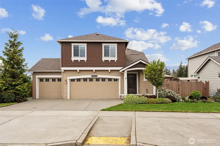 Extra wide driveway with the bonus garage!