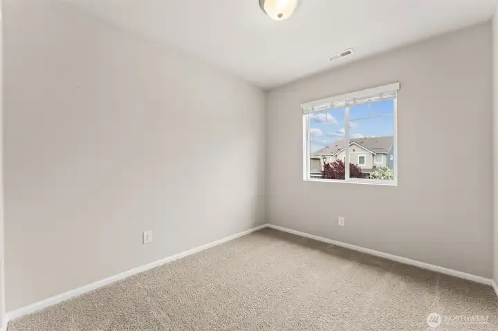 Upstairs laundry room with washer/dryer included.