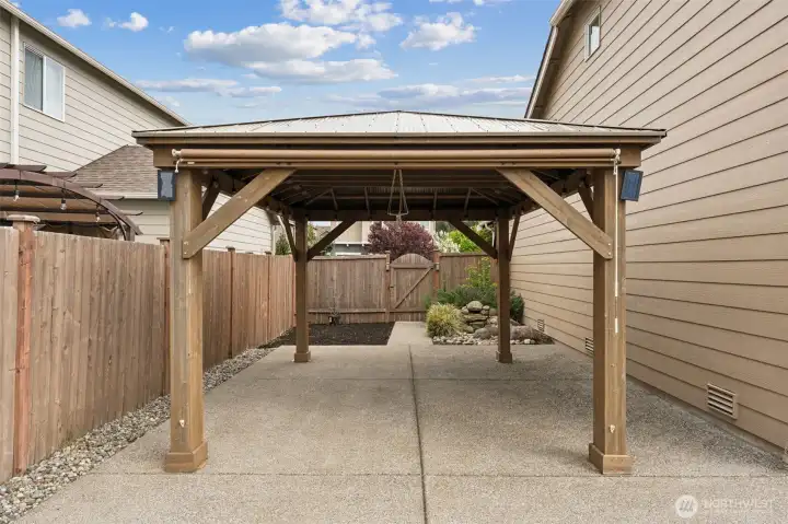 Expansive views from home. Lot is fully fenced.  Planter boxes line the top of the slope.
