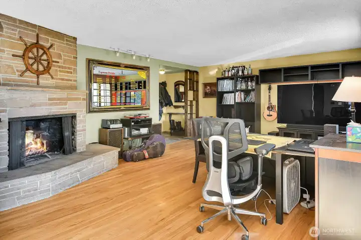 Stay cozy all winter with a roaring fire.  There is plenty of room on the hearth to store some wood, and just outside the French doors is a deck that runs the length of the house where you can keep more wood close at hand.