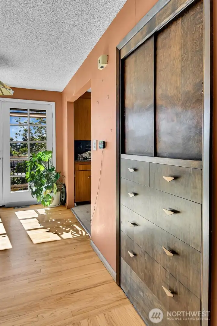 If you are a fan of mid-century craftsmanship and utility you will fall in love.  You will find built-in storage options throughout the house.