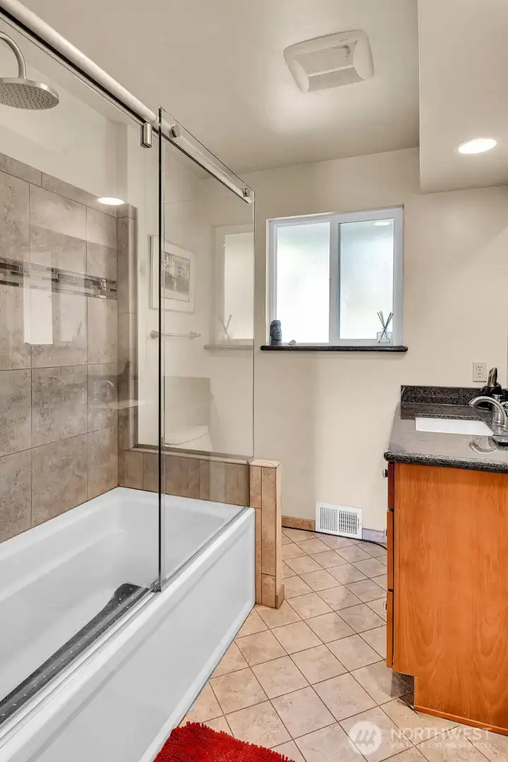The bathroom on the main floor has been updated and features a bidet toilet.