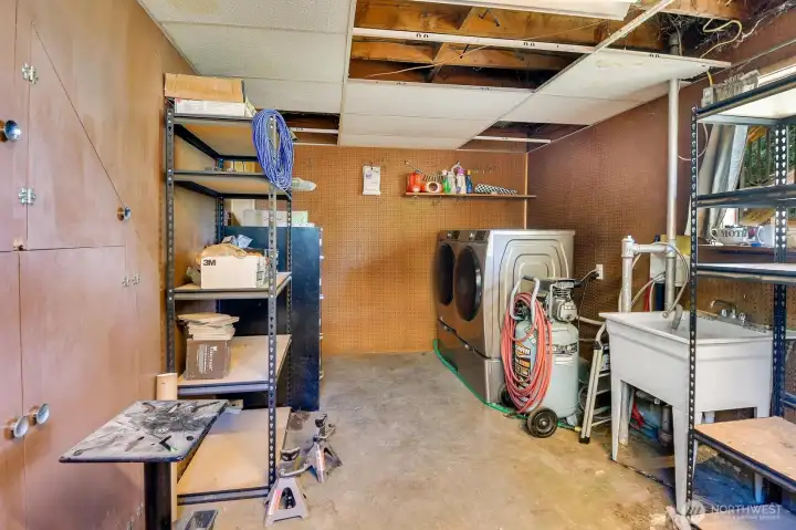 Tons of built in storage in the utility room.