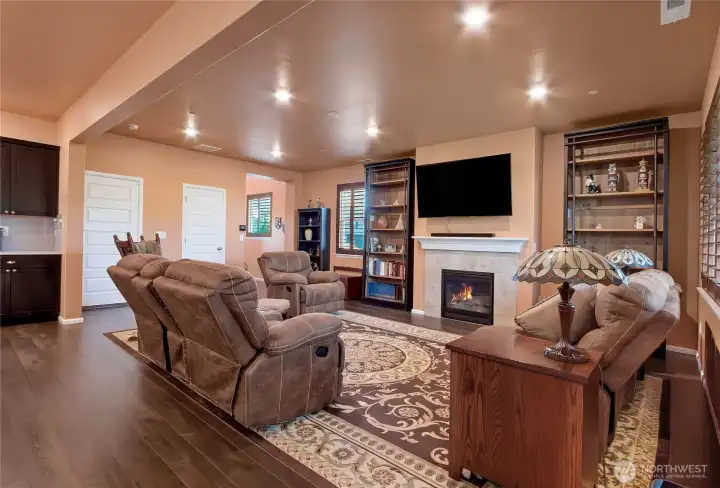 Gas fireplace in great room. Coffee bar and garage entrance to the left of great room. Gas fireplace in great room. Coffee bar and garage entrance to the left of great room.