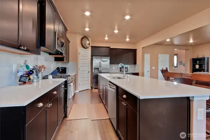 Kitchen offers an abundance of cabinets and storage along with gas stove. Kitchen offers an abundance of cabinets and storage along with gas stove.