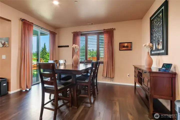 Dining space with slider to covered back patio. Dining space with slider to covered back patio.