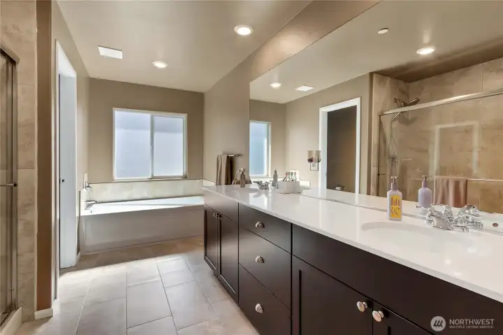 Guest bath with walk in shower, soaking tub and double sinks. Guest bath with walk in shower, soaking tub and double sinks.