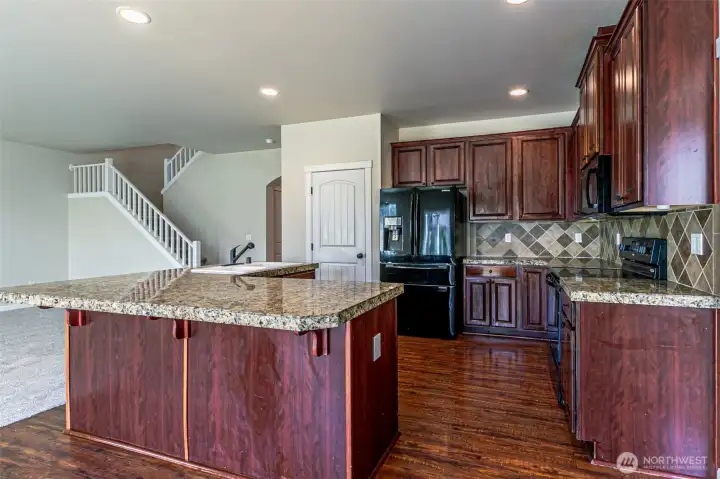 Kitchen with Large island and walk-in pantry.